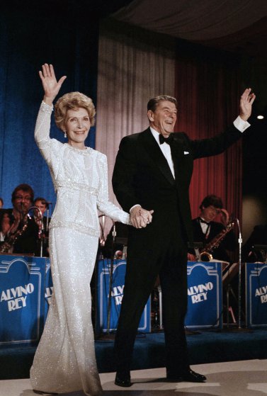 President Ronald Reagan and Mrs Nancy Reagan arrive at the inaugural ball in the Washington Hilton on Jan. 21, 1985. (AP Photo/Ira Schwarz)
