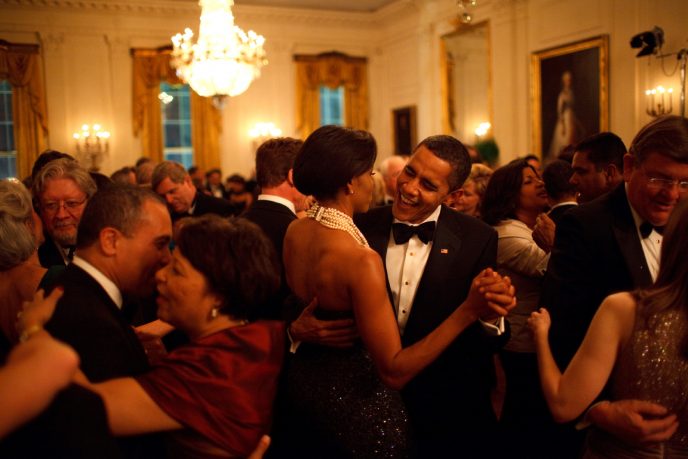 President Barack Obama and First Lady Michelle Obama dance while the band Earth, Wind and Fire performs at the Governors Ball in the State Dining Room of the White House 2/22/09. Official White House Photo by Pete Souza